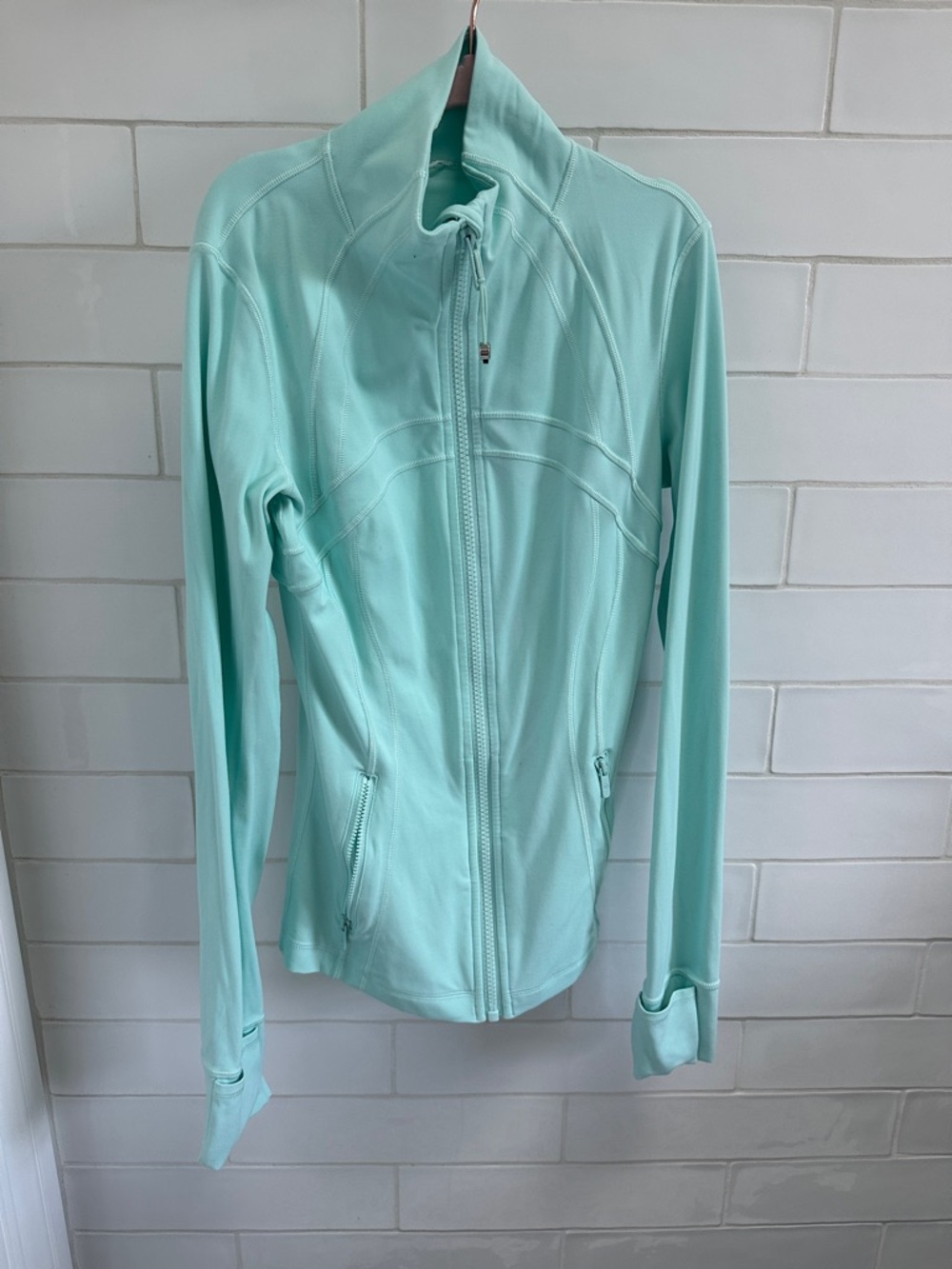 Lululemon size 2 Women’s Mint Zip-Up Active Jacket with stain on back (see pics)